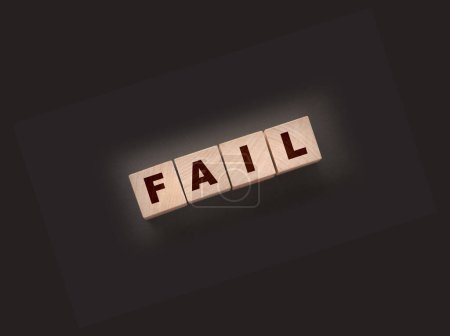 Photo for FAIL Word text Written In Wooden Cube blocks on black background. Business crisis concept. - Royalty Free Image