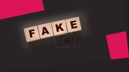 Photo for FAKE word written in wooden blocks on black background - Royalty Free Image
