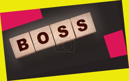 Photo for The boss sign on a wooden cubes on black. Business owner concept. - Royalty Free Image