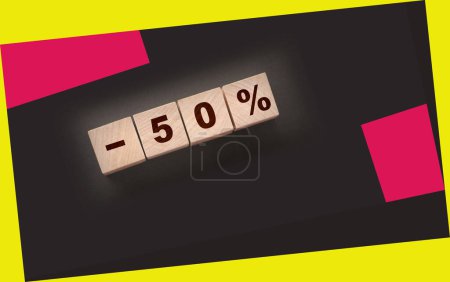 Photo for Minus 50 percent phrase on wooden blocks on black background. Sale business concept. - Royalty Free Image