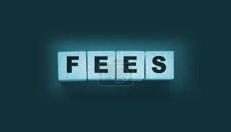 Photo for Wooden blocks with the word Fees . Taxes and fees business concept. - Royalty Free Image