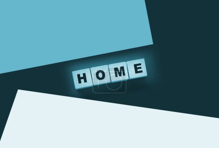 Photo for Wooden cubes with the word home, home on a black background. - Royalty Free Image