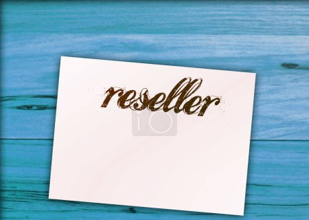 Photo for RESELLER Word on page and paper dollar signs around on wooden table. - Royalty Free Image