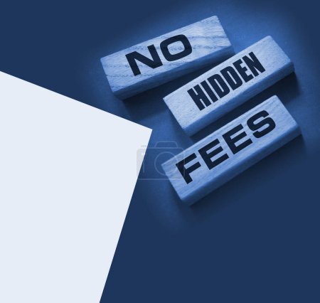 No hidden fees word written on wood block. Taxes and fees Financial business concept.