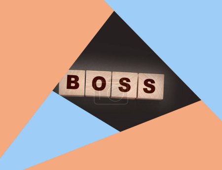 The boss sign on a wooden cubes. Business owner concept.
