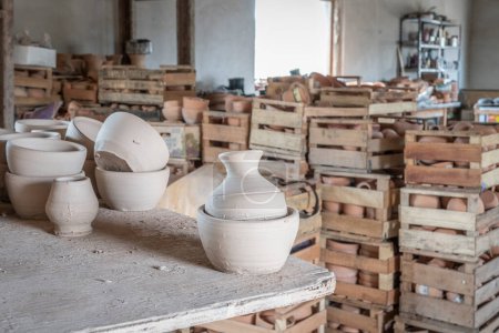 Detail of bowls and vessels made with clay in an artisanal ceramics factory