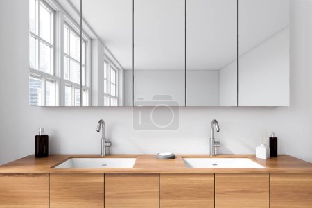 Photo for White bathroom interior with double sink and wooden dresser. Bathing accessories and mirror, panoramic window on skyscrapers. 3D rendering - Royalty Free Image