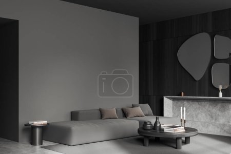 Photo for Dark living room interior with sofa and coffee table with decoration on carpet, grey concrete floor. Relaxing corner and mock up empty wall. 3D rendering - Royalty Free Image