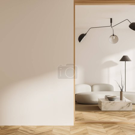 Téléchargez les photos : Vue de face sur lumineux salon intérieur avec canapé, mur blanc vide, parquet en chêne, tapis, table basse, arche. Concept de design minimaliste. Rendu 3d - en image libre de droit