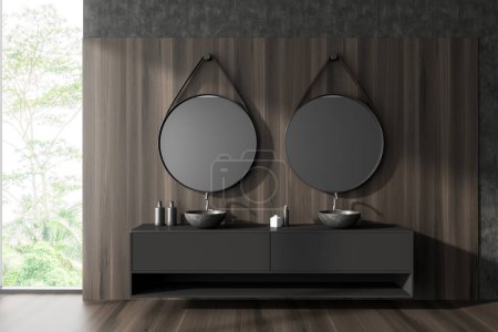 Photo for Dark bathroom interior with double sink and dresser, bath accessories and two round mirrors. Panoramic window on tropics. 3D rendering - Royalty Free Image