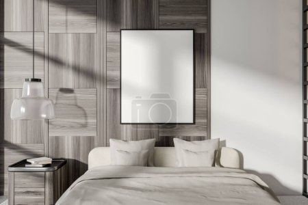 Foto de Elegante dormitorio cama interior y ropa de cama beige, decoración de arte minimalista en la mesita de noche. Cartel de lona simulada en pared de madera gris. Renderizado 3D - Imagen libre de derechos