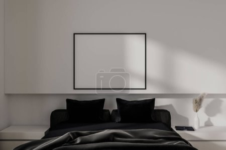 Foto de Dormitorio blanco cama interior con ropa de cama negra, decoración de arte minimalista en el estante. Mock up cartel de lona. Renderizado 3D - Imagen libre de derechos