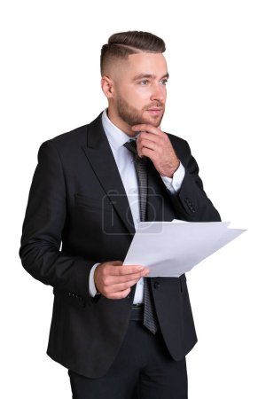 Photo for Businessman with pensive look and papers in hand, side view. Concentrated man in black formal suit with financial report. Isolated over white background. Concept of analysis - Royalty Free Image