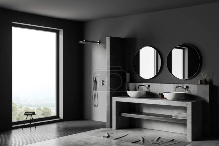 Photo for Dark bathroom interior with shower and double sink, side view carpet on grey concrete floor. Stylish bathing accessories on shelf. Panoramic window on countryside. 3D rendering - Royalty Free Image