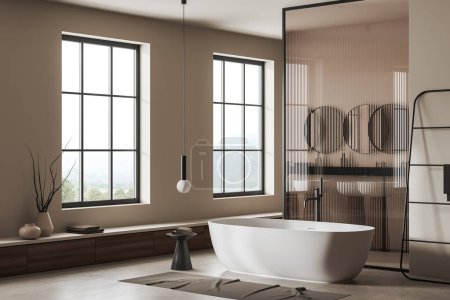 Foto de Beige bathroom interior with bathtub and glass partition, side view. Panoramic window on countryside, bathing corner with double sink and accessories. 3D rendering - Imagen libre de derechos