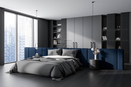 Photo for Dark bedroom interior bed and shelf with decor, side view on black hardwood floor. Sleeping corner with blue accent wall and panoramic window on skyscrapers. 3D rendering - Royalty Free Image