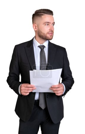 Foto de Businessman portrait profile holding business papers. Busy man in black formal suit with financial business report. Isolated over white background. Concept of analysis - Imagen libre de derechos
