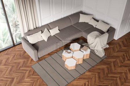 Foto de Top view on bright living room interior with large sofa, coffee table, panoramic window, crockery, books, white wall, hardwood floor. Concept of minimalist design. Place for meeting. 3d rendering - Imagen libre de derechos