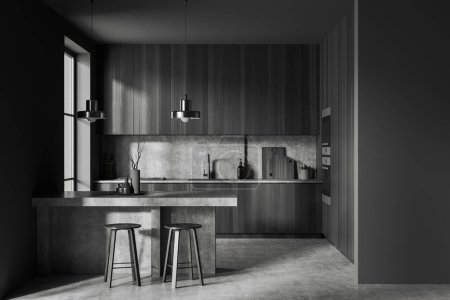 Téléchargez les photos : Dark kitchen interior with bar stool and island on grey concrete floor. Kitchenware on deck with decoration, cooking area with window. 3D rendering - en image libre de droit