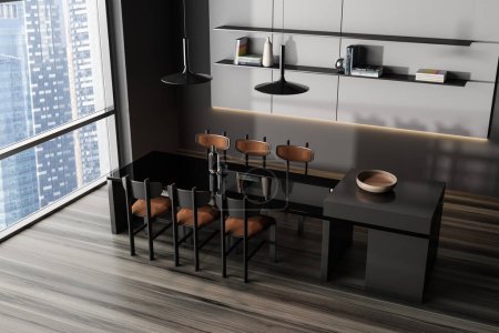 Téléchargez les photos : Top view of dark living room interior with dining table and chairs, hardwood floor. Shelf with decoration, panoramic window on skyscrapers. 3D rendering - en image libre de droit