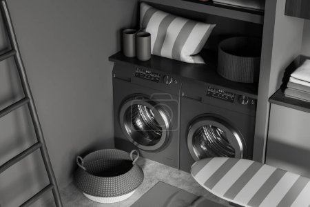 Téléchargez les photos : Top view of dark kitchen interior with two washing machines, basket and ironing board on grey concrete floor. Cooking room with laundry space. 3D rendering - en image libre de droit
