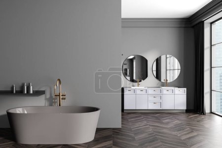 Photo for Front view on dark bathroom interior with bathtub, double sink, two round mirrors, shelf, panoramic window, grey walls, oak wooden hardwood floor. Concept of water treatment. 3d rendering - Royalty Free Image