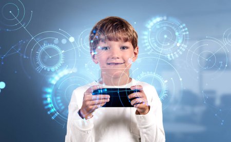 Foto de Smiling handsome boy wearing casual wear typing on smartphone with digital interface with pie diagrams holograms and line connection. Concept of modern technology of artificial intelligence, learning - Imagen libre de derechos