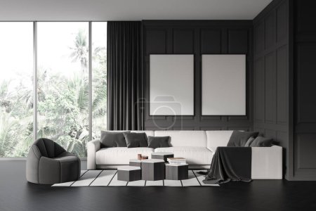 Téléchargez les photos : Dark living room interior armchair and sofa with coffee table, carpet on black hardwood floor. Panoramic window on tropics. Two mock up canvas posters. 3D rendering - en image libre de droit