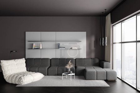 Téléchargez les photos : Front view on dark living room interior with sofa, panoramic window, armchair, shelf, panoramic window, books, grey wall, hardwood floor. Concept of minimalist design. Place for meeting. 3d rendering - en image libre de droit