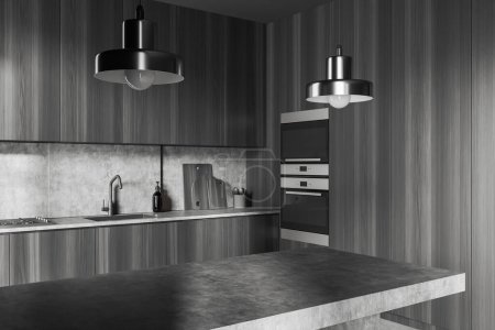 Photo for Dark kitchen interior with bar countertop, side view. Sink, stove and oven mounted in black wooden wall. Cooking corner with hidden design. 3D rendering - Royalty Free Image