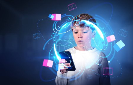 Photo for Boy wearing casual wear holding smartphone and watching at metaverse reality with blockchain system. Blue background with virtual globe. Concept of modern technology, progressive currency in business - Royalty Free Image