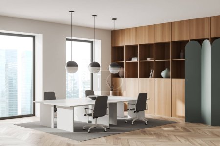 Téléchargez les photos : Modern office interior with armchairs and desk on carpet, hardwood floor. Wooden shelf with books and panoramic window on skyscrapers. 3D rendering - en image libre de droit