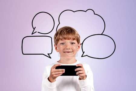 Photo for Happy child boy with smartphone in hands, portrait looking at the camera and different thought and speech bubbles. Concept of online games and internet - Royalty Free Image