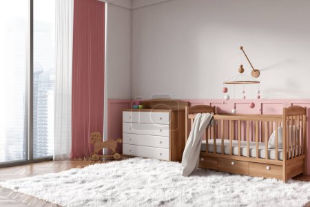 Foto de Pink and white baby room interior with wooden crib, side view carpet on hardwood floor. Nursery space with sideboard and panoramic window on skyscrapers. 3D rendering - Imagen libre de derechos