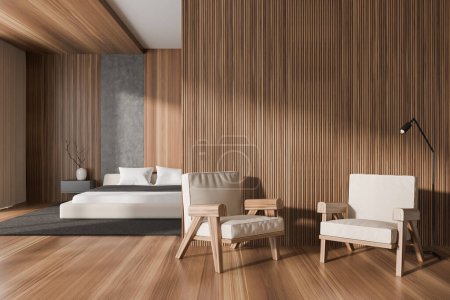 Photo for Front view on bright bedroom interior with bed, bedsides, armchairs, carpet, oak hardwood floor, wooden wall. Concept of minimalist design. Space for chill and relaxation. 3d rendering - Royalty Free Image