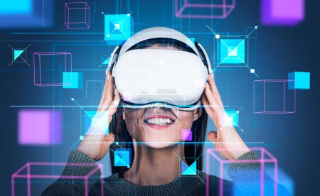 Foto de Happy woman in vr glasses portrait, digital hologram with information fields, data blocks in cyberspace. Concept of virtual reality and metaverse - Imagen libre de derechos