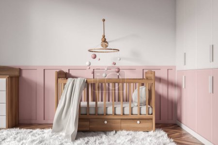 Téléchargez les photos : White and pink baby room interior with wooden crib, carpet on hardwood floor. Nursery space with toys, decoration and shelf. 3D rendering - en image libre de droit