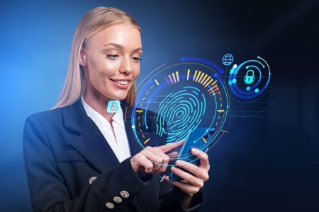 Foto de Businesswoman smiling working with phone, glowing fingerprint hud hologram with cybersecurity and padlock icon. Concept of biometric identity and privacy - Imagen libre de derechos