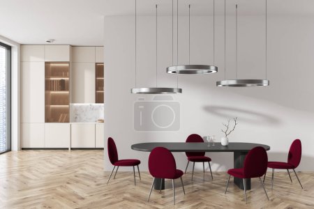 Téléchargez les photos : White kitchen interior with dining table and armchairs on hardwood floor. Cooking space behind partition, decoration and panoramic window on skyscrapers. 3D rendering - en image libre de droit