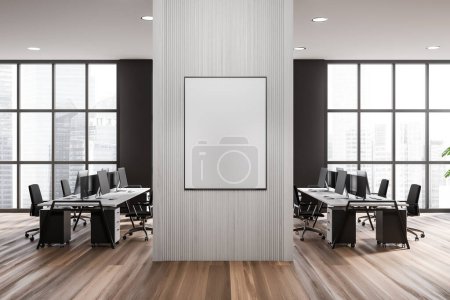 Foto de Stylish coworking interior with pc computer on desk and armchairs. Office workspace with panoramic window on skyscrapers. Mockup canvas poster. 3D rendering - Imagen libre de derechos