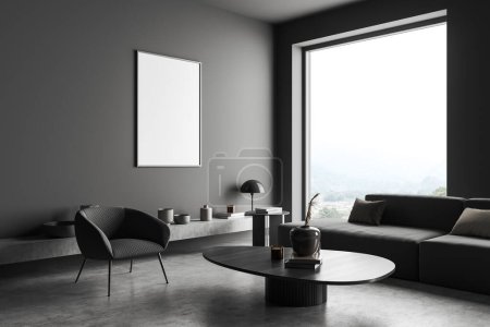Téléchargez les photos : Dark living room interior with armchair and sofa, side view, coffee table with art decoration on grey concrete floor. Panoramic window on countryside. Mock up blank poster. 3D rendering - en image libre de droit