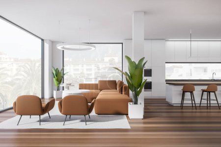 Photo for Front view on bright studio room interior with island with barstools, panoramic window, sofa, armchair, white wall, sink, oven, oak wooden floor. Concept of minimalist design. 3d rendering - Royalty Free Image