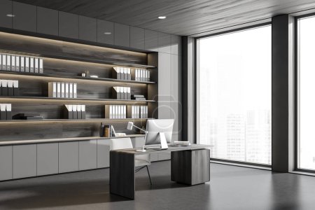 Photo for Dark business room interior with pc computer, side view, grey concrete floor. Cabinet with documents and folders, panoramic window on city view. 3D rendering - Royalty Free Image