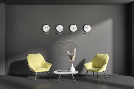Foto de Front view on dark office interior with two green armchairs, coffee table with laptop and vase, clocks on grey wall and concrete floor. Concept of place for working process. 3d rendering - Imagen libre de derechos