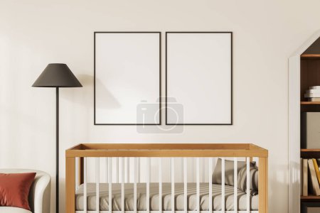 Téléchargez les photos : Cozy baby room interior with wooden crib and shelf with decoration. Nursery space with two mock up canvas posters in row. 3D rendering - en image libre de droit