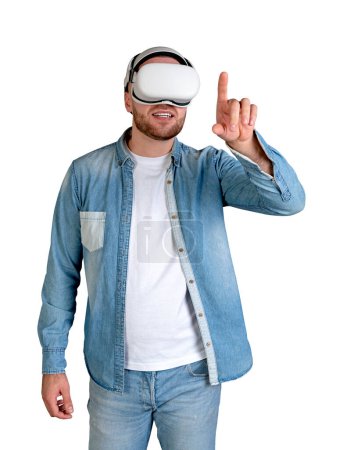 Photo for Happy young man wearing vr glasses headset, finger touching something isolated over white background. Concept of virtual world and technology - Royalty Free Image
