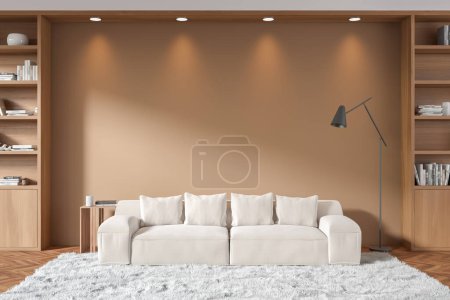 Téléchargez les photos : Beige relaxing room interior with sofa and wooden shelf with decoration. Soft place with lamp on carpet, hardwood floor. Mockup copy space empty wall. 3D rendering - en image libre de droit