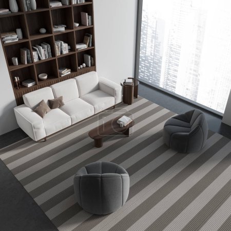 Téléchargez les photos : Top view of living room interior with sofa and armchairs, carpet on grey concrete floor. White chill corner with shelf and panoramic window on skyscrapers. 3D rendering - en image libre de droit