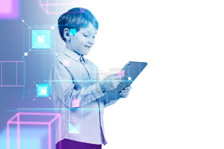 Photo for Boy wearing formal wear is holding tablet device with digital interface metaverse reality blockchain system. White background. Concept of futuristic technology, virtual reality and progressive kids - Royalty Free Image