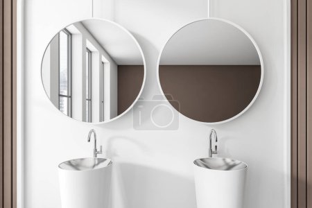 Téléchargez les photos : White bathroom interior with double sink and two round mirror, window on city view. Modern washing room in hotel apartment. 3D rendering - en image libre de droit